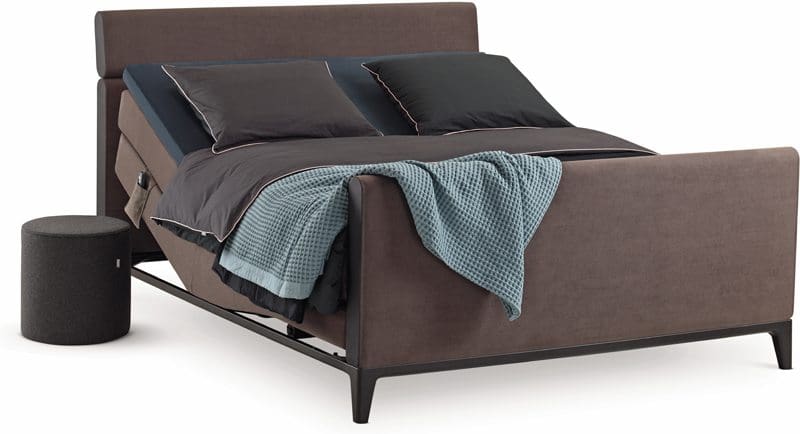 Boxspring Criade van Auping, afgebeeld met hoofdbord Bend, stel uw bed naar wens samen!