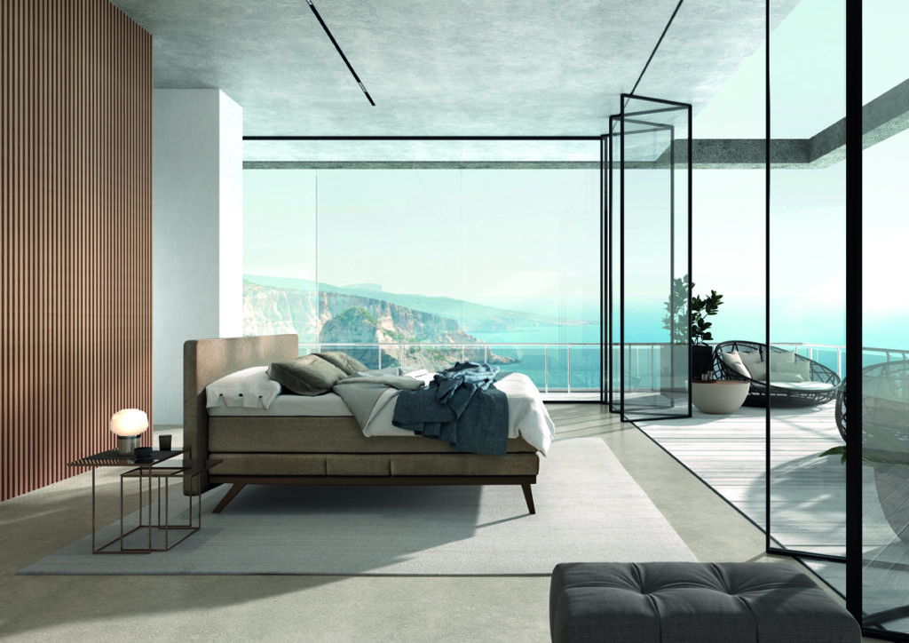 Moderne slaapkamer met groot raam en uitzicht op zee